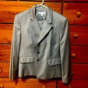 Gray suit set with floral embellishments around the pockets and collar